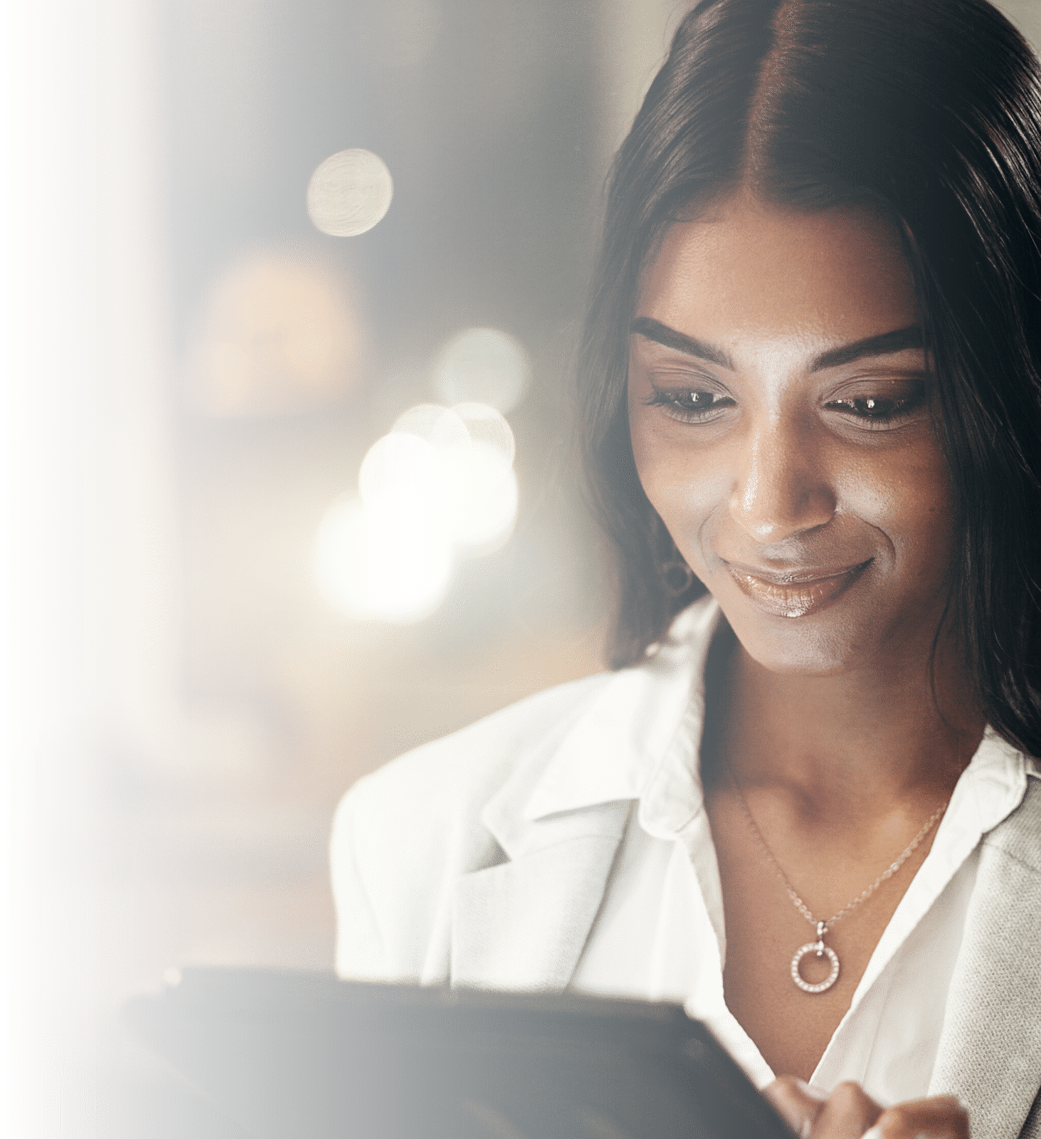 Tablet, overtime and woman in office with smile, reading email or social media post, schedule or report. Planning, research and businesswoman, late at night work and search for ideas on online review.
