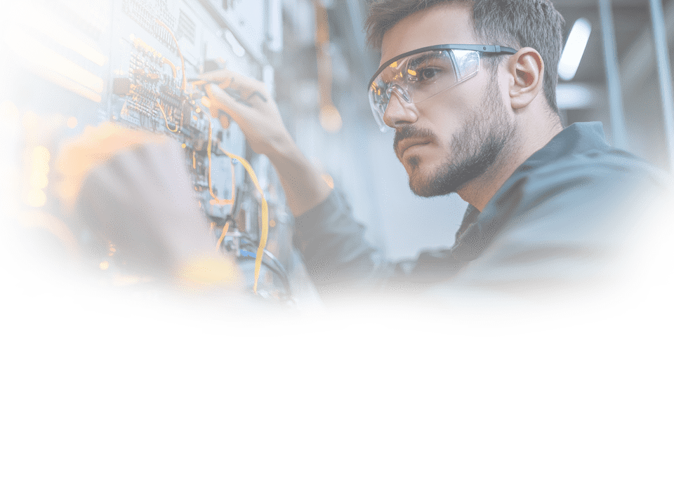 An electrical engineer working in a high-tech lab, wearing safety glasses and holding tools while inspecting complex circuitry. The engineer is focused on a large control panel filled with wires, circuit boards, and electronic components. Nearby, digital monitors display electrical schematics and real-time data. The background shows an industrial workspace with advanced equipment, highlighting the precision and technical skill involved in the engineer's work. The scene is lit with bright, clean lighting, capturing the innovation and complexity of electrical engineering. --ar 16:9 --style raw --v 6.1 Job ID: 98e626a7-4529-4dde-af08-dd29cc17cb1e